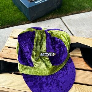 Disney Goofy hat in purple and green velvet with floppy ears.